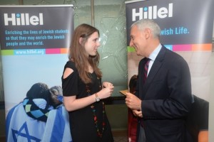 Eric Fingerhut, Hillel International's president and CEO, speaks with former student board member JoHanna Rothseid. Photo: Shahar Azran for Hillel.