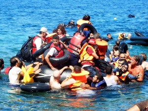 IsraAid helped refugees to reach the shore after their boat overturned off the Greek coast on September 13. Photo: IsraAID.