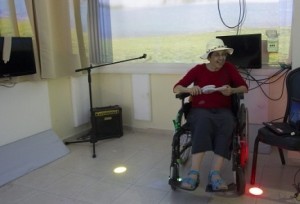 Former journalists Rika Bider (pictured), 52, suffers from multiple sclerosis and uses the music room of the Grabski Rehabilitation Center in northern Israel. Photo: Michel Dot Com via Israel Hayom.