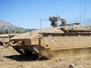 The Namer APC. Israeli defense industries are building the Eitan, which will half as much. Photo: Abir Sultan/Wikimedia Commons.