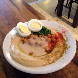 A hummus cafe in Israel is offering 50 percent off to Jewish and Arab customers who sit together. Photo: Facebook.