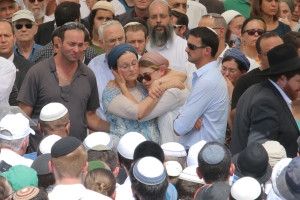 Funeral of Rabbi Nehemiah Lavie, who was murdered last night by a Palestinian terrorist. The rabbi was buried in Jerusalem on Sunday, October 4 - his mother is in the light blue dress surrounded by family and hundreds of mourners.