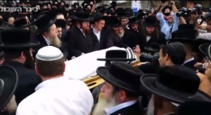 The funeral of Rabbi Yeshayahu Akiva Krishevsky, killed in a terror attack in Jerusalem on Tuesday morning. Photo: screenshot/Kikar HaShabbat.