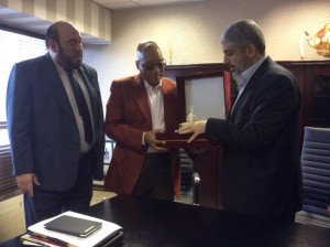 South African President Jacob Zuma accepts a gift from Hamas leader Khaled Mashal. Photo: Twitter.