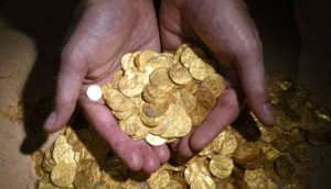 A chest of Ottoman-era gold coins discovered in Gaza during road work. Photo: Twitter.