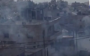 Smoke from firecrackers thrown at Israeli security forces in Jerusalem's Armon HaNetziv neighborhood on Wednesday morning. Photo: Screenshot.