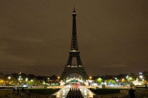 The Eiffel Tower stands dark after 129 were killed in terror attacks across Paris. Photo: Paris. 