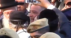 Doron Mizrahi (center), eulogizing his son, Ziv, on Tuesday. Photo: Screenshot.