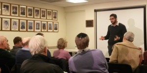 Hussein Aboubakr Mansour (pictured at right, standing) speaks at the Jewish Community Center of Stamford, Conn. Photo: Courtesy StandWithUs.