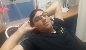 Yishai Kreitenberger, the security guard who shot and killed a female Palestinian terrorist at the entrance to Beitar Illit on his 33rd birthday. Photo: Screenshot.