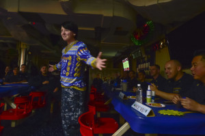 Cryptologic Technician (Maintenance) 2nd Class Eva MacFarland models a Hanukkah sweater during a Coalition of Sailors Against Destructive Decisions (CSADD) sponsored Ugly Holiday Sweater contest aboard guided-missile destroyer USS Gridley (DDG-101). Photo: U.S. Naval Forces Central Command/U.S. Fifth Fleet.