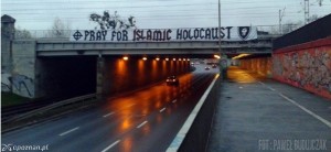 'Pray for Islamic Holocaust,' reads a crude banner over a highway in Polish city Poznan. Photo: Courtesy
