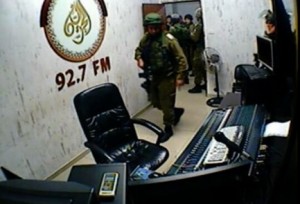 IDF troops raid the Al-Huriya radio station in Hebron. Photo: Twitter.