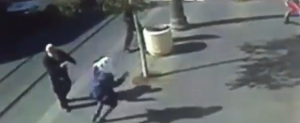 CCTV footage in Jerusalem shows stabbing attack, police subduing teenage assailants. Photo: Screenshot