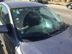 The car hit by rocks near Beitar Illit onn Thursday morning. Photo: Judea-Samaria press.