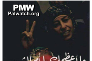 In this photo published on the Facebook page of the Palestinian Fatah faction, the mother of late Palestinian terrorist Muhammed Shamasneh makes a “V” sign with her right hand. The caption reads, “How great you are, O mother of the Martyr.” Photo: Palestinian Media Watch. 