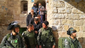Jews being evacuated from Hebron apartments. Photo: Courtesty/Jewish Community of Hebron.