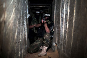 A Hamas fighter inside a terror tunnel from Gaza into Israel. Photo: Twitter.