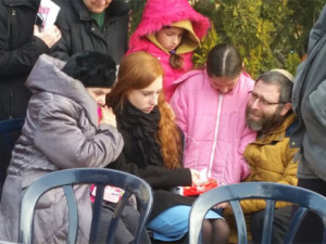 The grief-stricken family of slain Israeli Dafna Meir, murdered by a Palestinian terrorist Sunday evening. Photo: Channel 2/Screenshot.