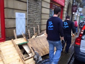 IsraAID volunteers provide flood relief in the UK. The delegation of Israeli volunteers are being hailed as heroes. Photo: IsraAID via Facebook.