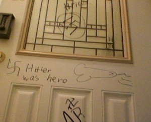 The antisemitic graffitti found on the door of a Satmar home in Brooklyn. The incident is being treated as a hate crime. Photo: Twitter.