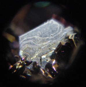 The Moissanite mineral.  The discovered The corundum stones contain a variety of rare minerals, including Moissanite and tistarite. Photo: Andrew Silver via Wikimedia Commons.