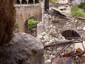 The ancient synagogue in Aleppo, that has taken a number of hits during battles between Assad's forces and opposition fighters. Photo: Screenshot.