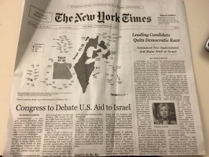 The front page of Tuesday's fake New York Times being handed out in Times Square. Photo: Twitter.