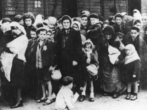 The arrival of Hungarian Jews to Auschwitz.  Fourteen Hungarian Holocaust survivors have filed a class action lawsuit in the U.S. against the Hungarian government. Photo: The German National Archive via Wikimedia Commons.