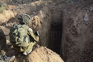 An IDF soldier at the entrance to a Hamas tunnel. Photo: Wikipedia.