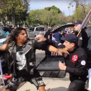 Violence at the KKK rally in California. A Jewish man at the scene managed to push the KKK leader out of harms way. Photo: YouTube. 