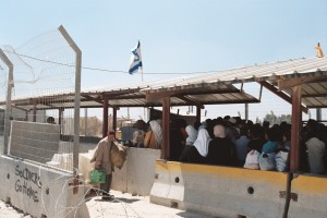 A checkpoint where Palestinians from Ramallah enter Israel to work. Photo: Wikipedia.