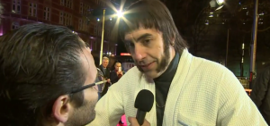 Israeli comedian Guri Alfi (left) interviewing Sacha Baron Cohen as Nobby on the red carpet in London. Photo: Screenshot.