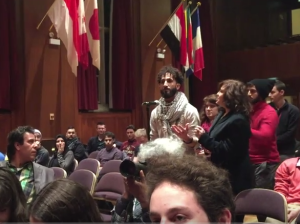Hostile questioner at Thursday's reception of Bassem Eid. Photo: Youtube