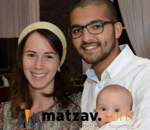 Tuvia Yanai Weissman, right, with his wife and child. The Israeli soldier was killed in a stabbing attack in West Bank. Photo: The Israel Project. 
