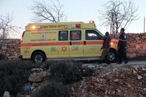 An ambulance at the scene of Tuesday's stabbing attack. The Israeli jogger was lightly wounded. Photo: Twitter.