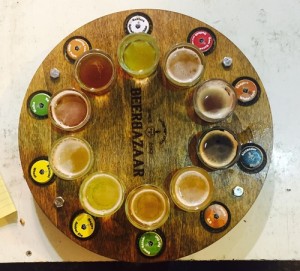 The tap wheel, giving customers a shot each of 10 beers, at the Beer Bazaar in Jerusalem's Shuk Mahane Yehuda. Photo: Maayan Jaffe.