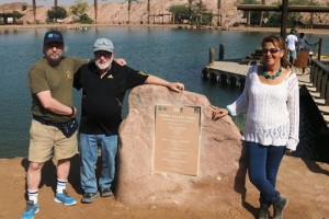 Pictured at the man-made lake created 30 years ago by their father, Avrum Chudnow, are David and Robert Chudnow, along with with Hagit Gal, manager of the Timna Valley National Park. Photo: JNF.