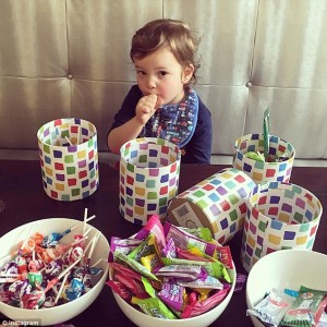 Ivanka Trump's son, pictured, helps fill Purim baskets. Photo: Instagram.