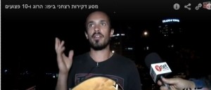 Yishay Montgomery broke his guitar by using it to subdue a terrorist who went on a stabbing rampage on Tuesday. Photo: Screenshot from Israel Hayom.