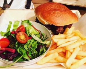 Eliana Rudee's Passover fare in Israel, including a hamburger on a potato bread bun. Photo: Eliana Rudee.