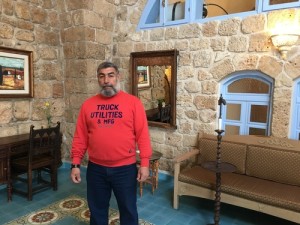 Muhammad Abu Marwan in a guest room in Akko's “Arabesque: An Arts and Residency Center.” Photo: Orit Arfa.
