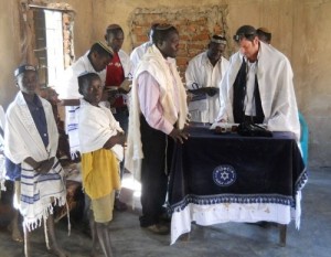 Members of the Abayudaya Jewish community near Mbale, Uganda. A group of converts to Judaism in Uganda gained official recognition from the Jewish Agency for Israel. Photo: Moshe Cohen via Wikimedia Commons.
