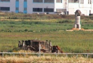 Friday's scene where a bomb exploded near the Israel-Gaza border. Photo: Emergency Team Yehudah Shomron. 