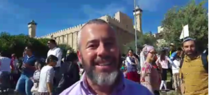 Yishai Fleisher, international spokesman for the Jewish community of Hebron, at the celebrations in Hebron. Photo: Facebook/Screenshot.