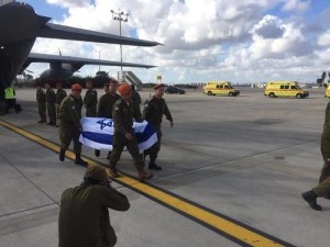 Wounded Israelis and the bodies of murdered Israelis arrive in Israel on March 20, after the Israel Defense Forces airlifted them from Turkey following the March 19 terror attack in Istanbul. Photo: Israeli Ministry of Foreign Affairs via Facebook.