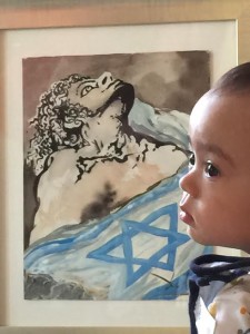 Jonathan Levine's young son Jacob with the 'Aliyah' painting. Photo: Courtesy. 