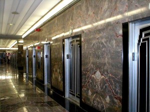 A set of elevators. Some tourists might find Shabbat elevators bizarre, according to a Reddit survey. Photo: Wikimedia Commons.