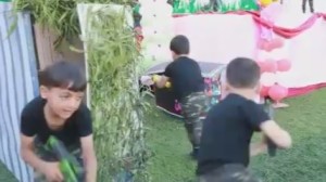 Young Palestinian boys urge each other to “die as martyrs” as part of a presentation at a children's festival in the Gaza Strip. Photo: MEMRI.