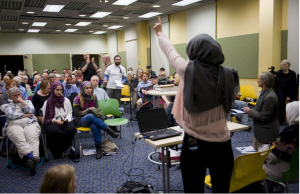 Daniel Swindell asking if Israel has the right to exist at Columbia Missouri Public Library. Photo: Daniel Brenner/Tribune, used by permission.